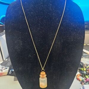 Elegant Gold Necklace with Opalescent Pendant